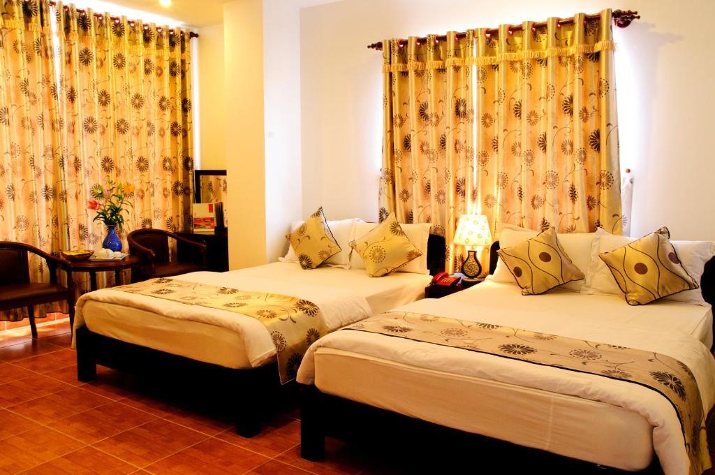 Minh Quan Hotel Bảo Lộc Værelse billede